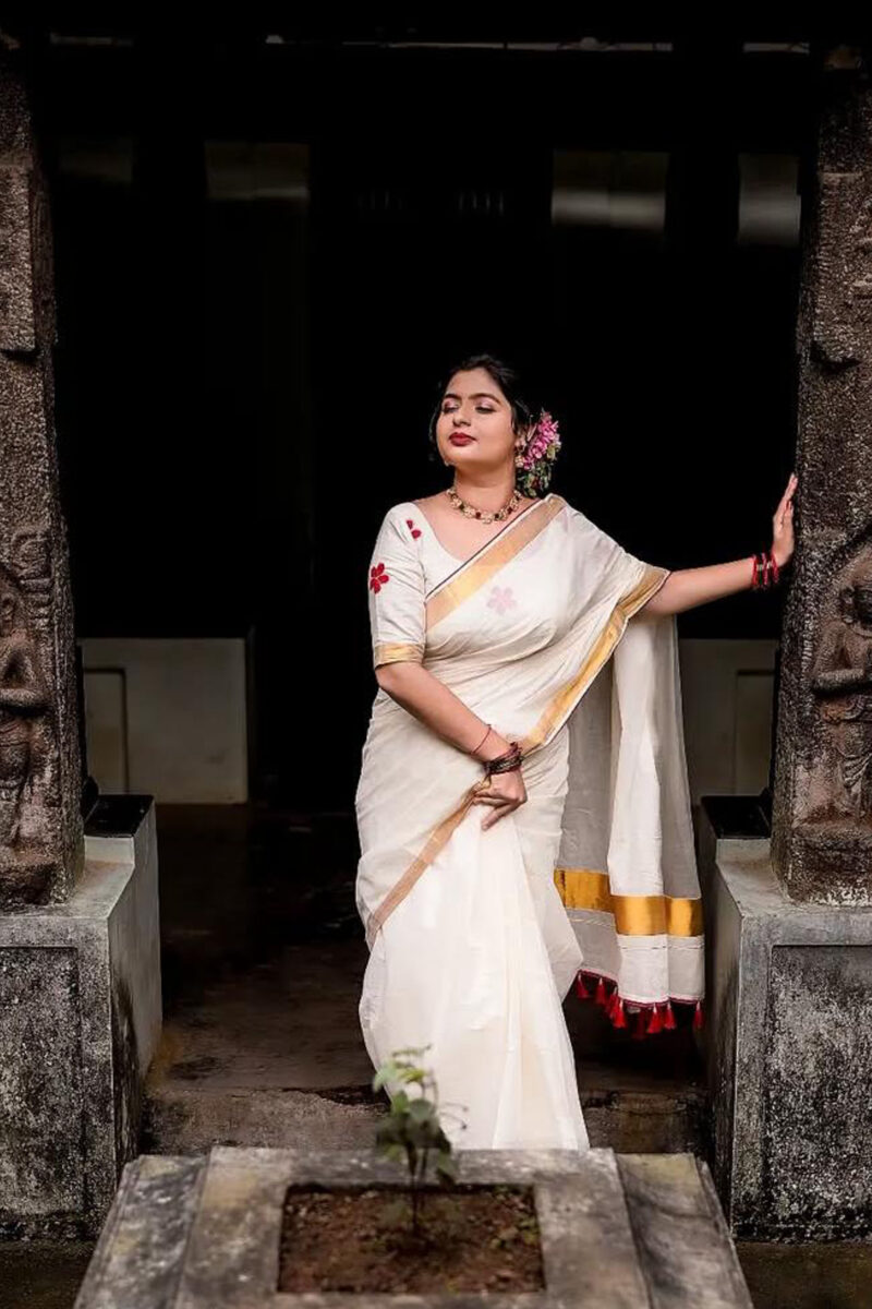 Kasavu Saree With Red Flower Blouse