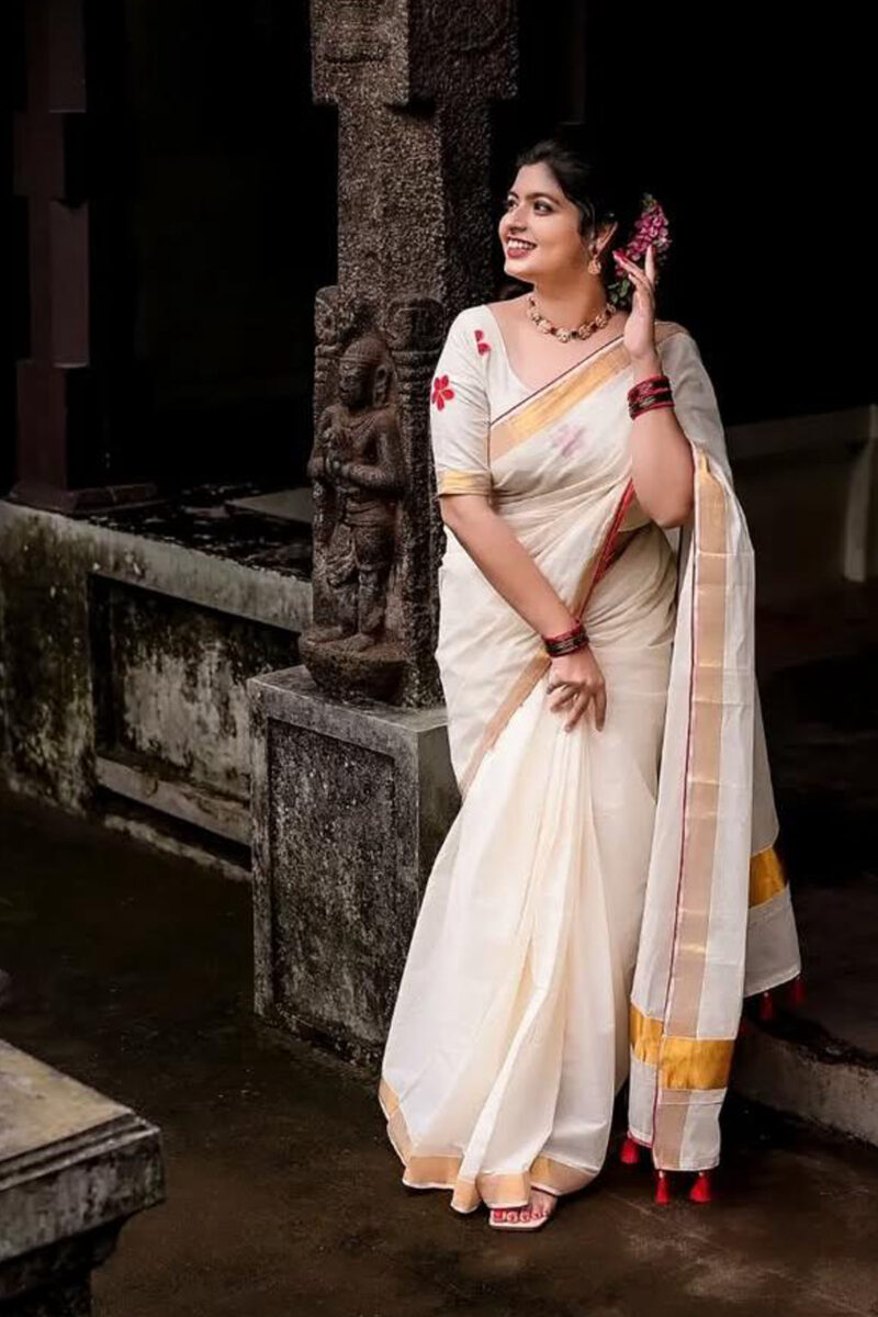 Kasavu Saree With Red Flower Blouse
