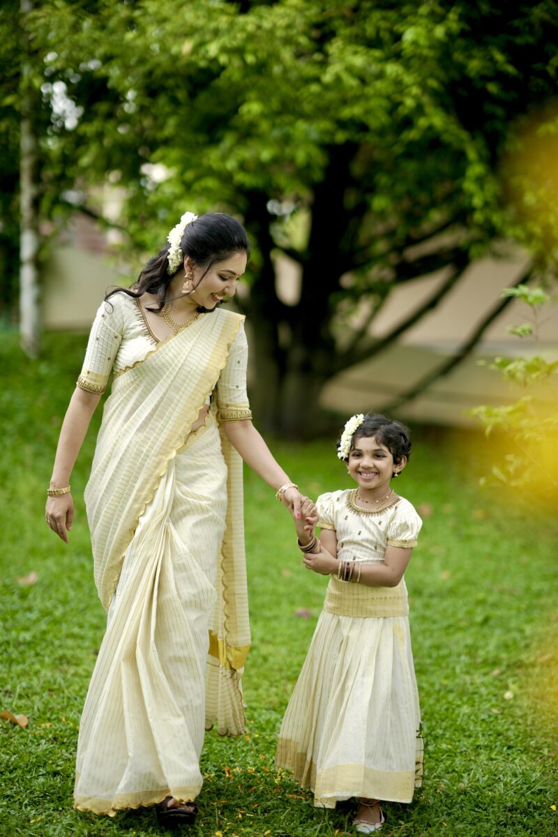 Kasavu soft cotton saree with hand work blouse and Baby Girl’s skirt and top with hand work