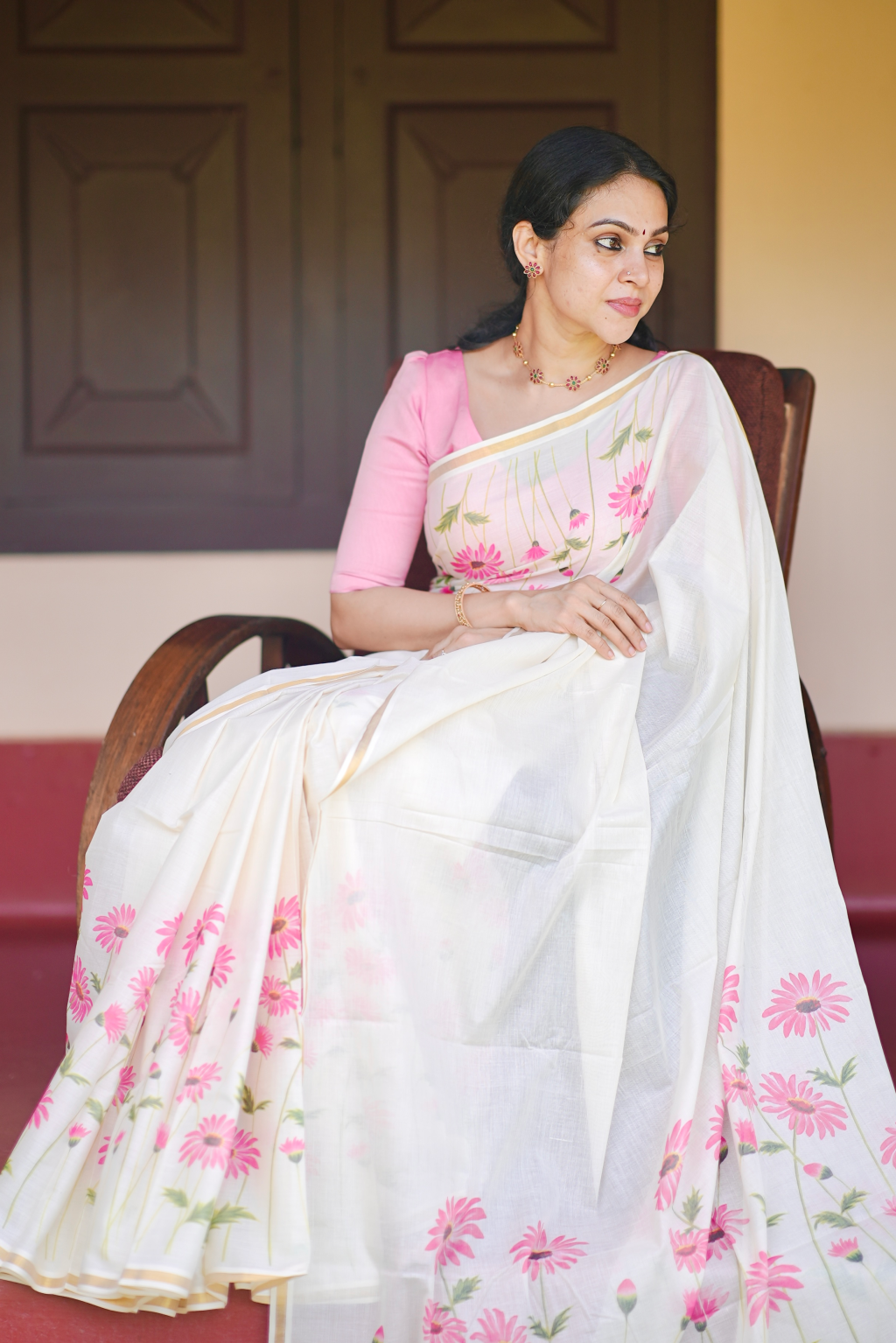 Kerala Kasavu pink floral print cotton saree