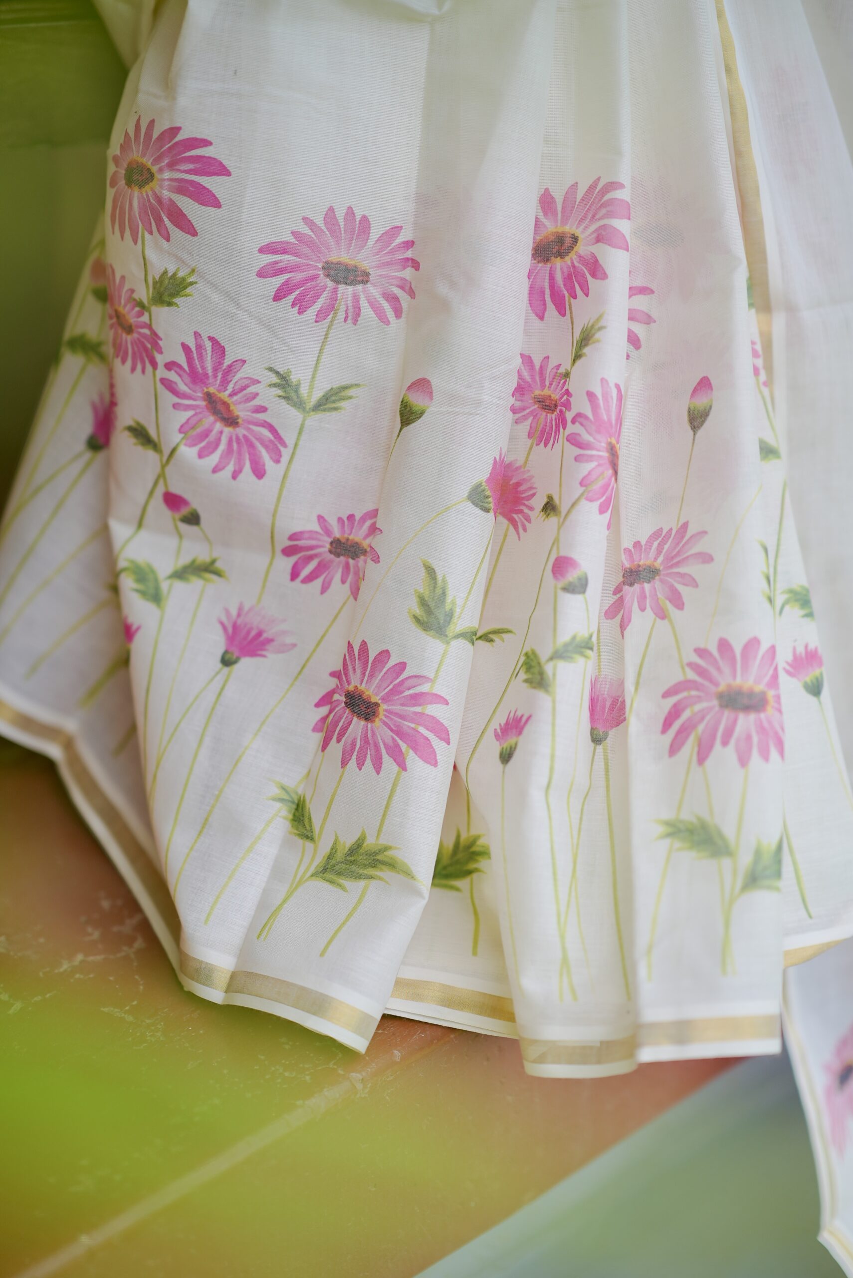 Kerala Kasavu pink floral print cotton saree