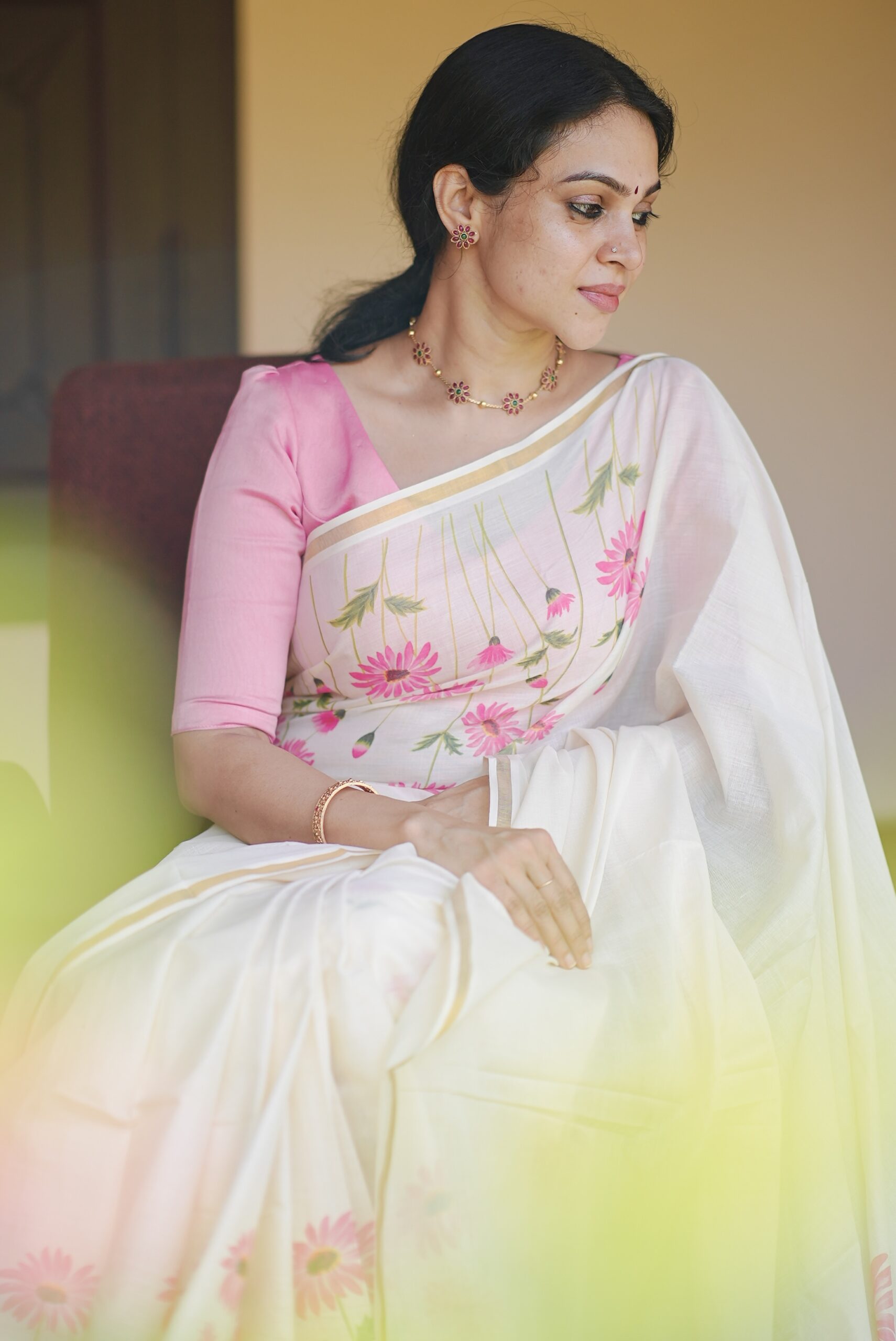 Kerala Kasavu pink floral print cotton saree